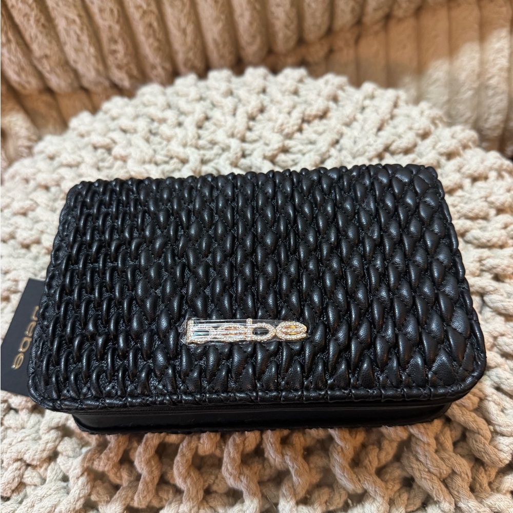 Bebe Black Woven Crossbody Bag with‎ Gold Chain Strap